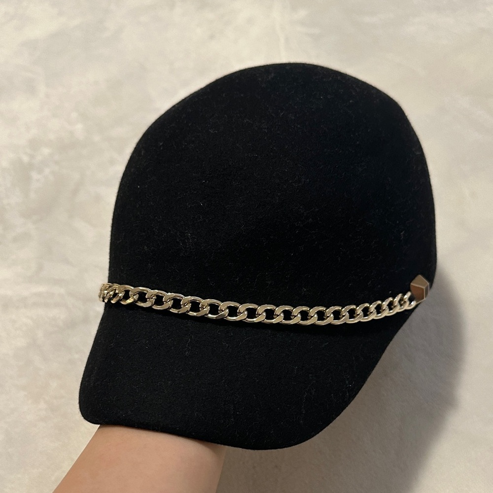 Chic Black Hat with Gold Chain Detail